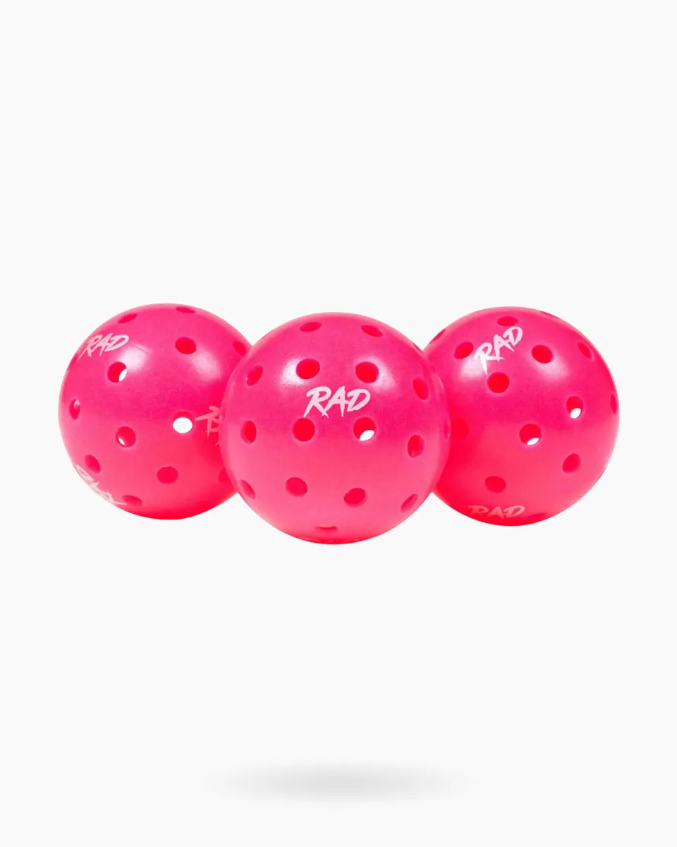 RAD Pro Outdoor Pickleballs set showing the vibrant neon color and 40-hole pattern 3 balls