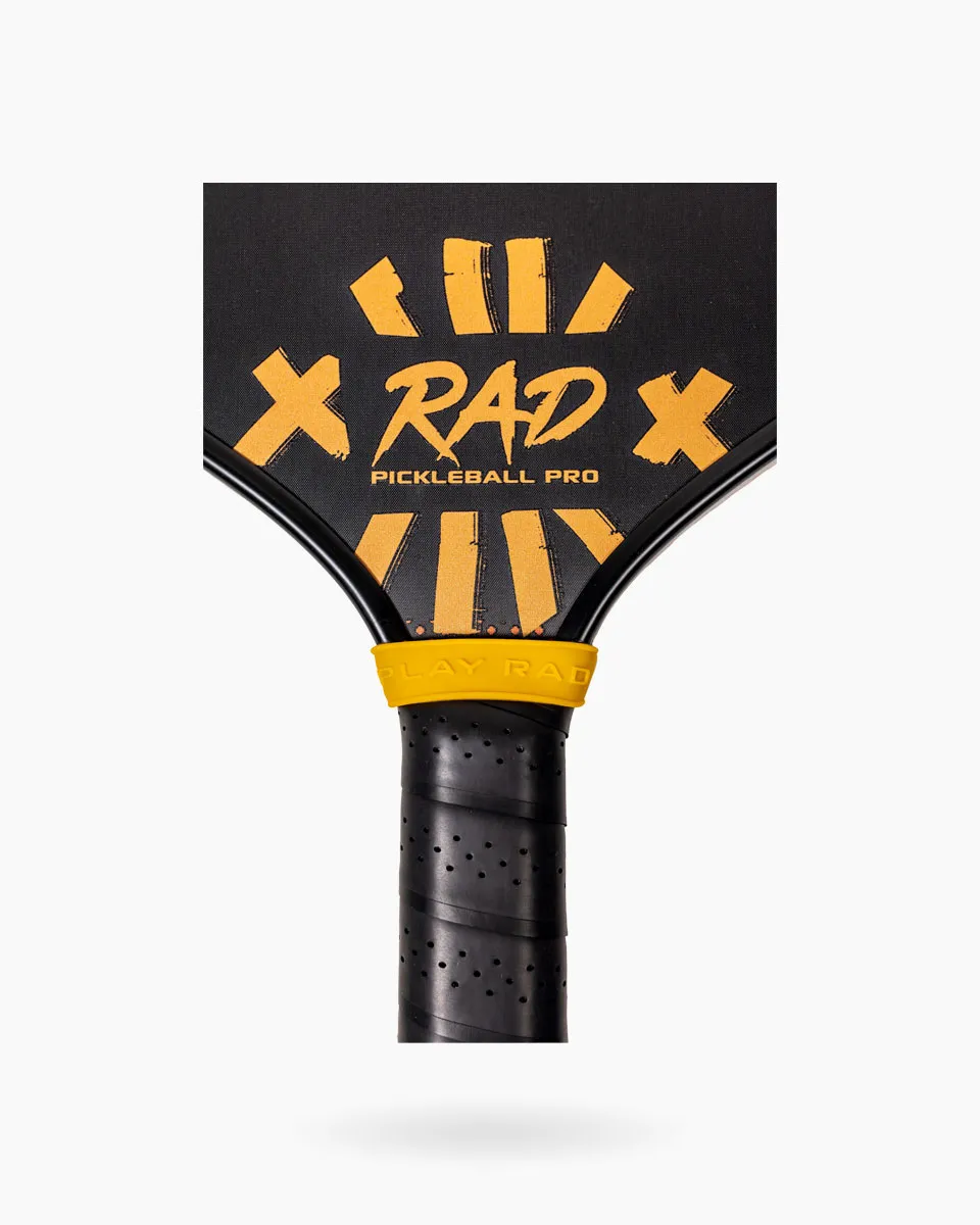 Detail of the 5.5 inch extended handle on the Maxime Pro for two-handed backhand stability