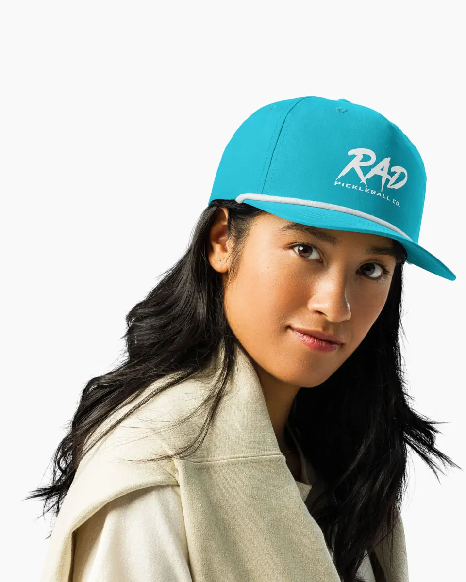 RAD Rope Cap being worn at the pickleball court representing a premium athletic aesthetic 1
