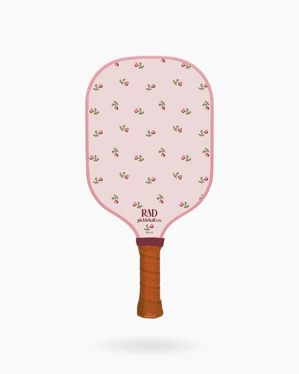 Detailed close-up of the fiberglass surface with Spin Grit texture on The Betty paddle for elite spin