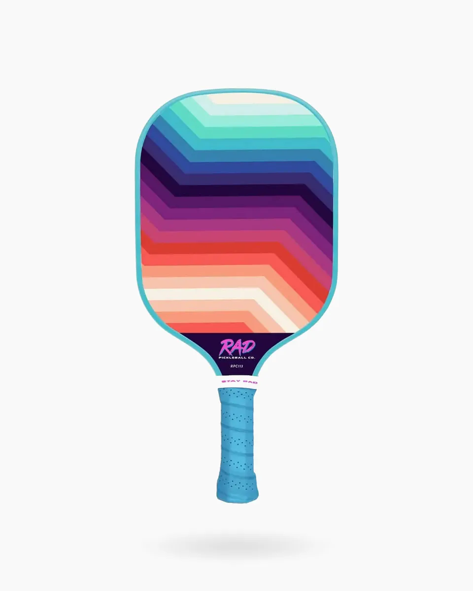 Close-up of the fiberglass surface with Spin Grit texture on The Zinger paddle for elite spin control